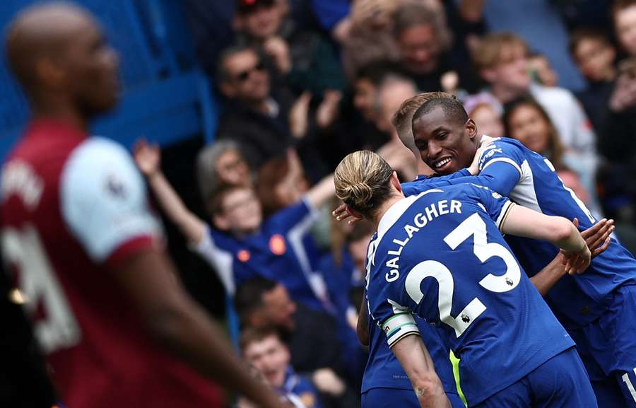 Chelsea's Senegalese striker #15 Nicolas Jackson (R) celebrates scoring the team's fourth goal