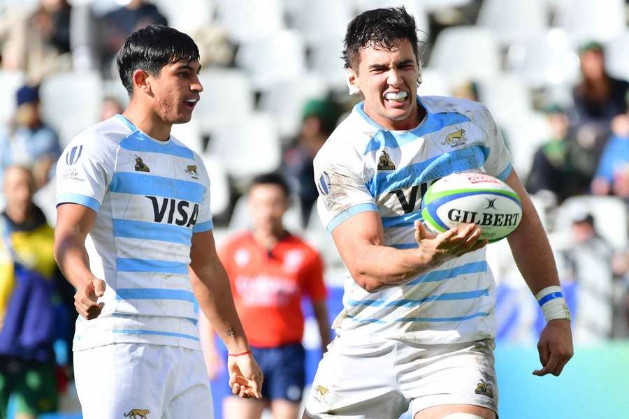 Efrain Elias, right, celebrates a try with Argentina Under-20s