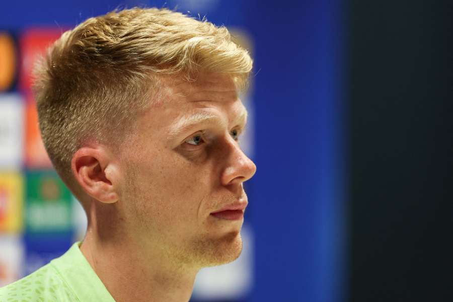 Schouten tijdens de persconferentie Schouten tijdens de persconferentie