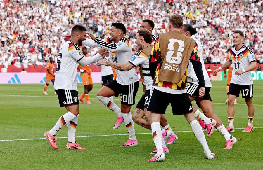 Deniz Undav celebrates with his teammates after scoring the winner for Germany Deniz Undav celebrates with his teammates after scoring the winner for Germany