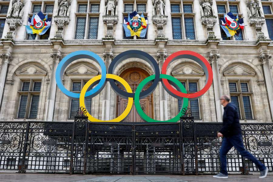 Olympic rings are seen in front of the Hotel de Ville City Hall in Paris