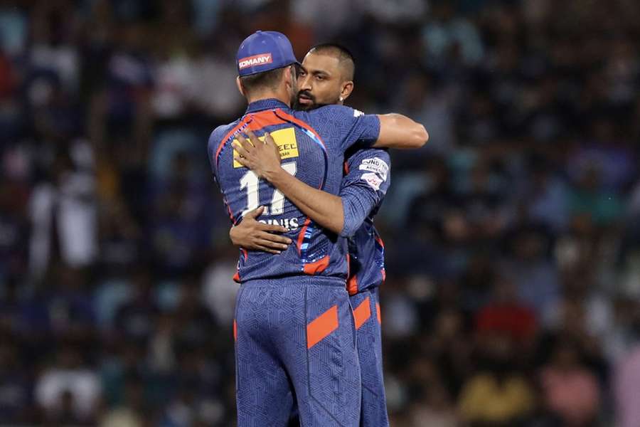 Krunal Pandya is congratulated after taking a wicket