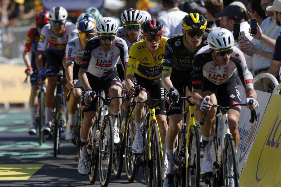Yellow Jersey overall leader Danish cyclist Jonas Vingegaard (C) of Team Visma | Lease a Bike in action during the 2nd stage Yellow Jersey overall leader Danish cyclist Jonas Vingegaard (C) of Team Visma | Lease a Bike in action during the 2nd stage