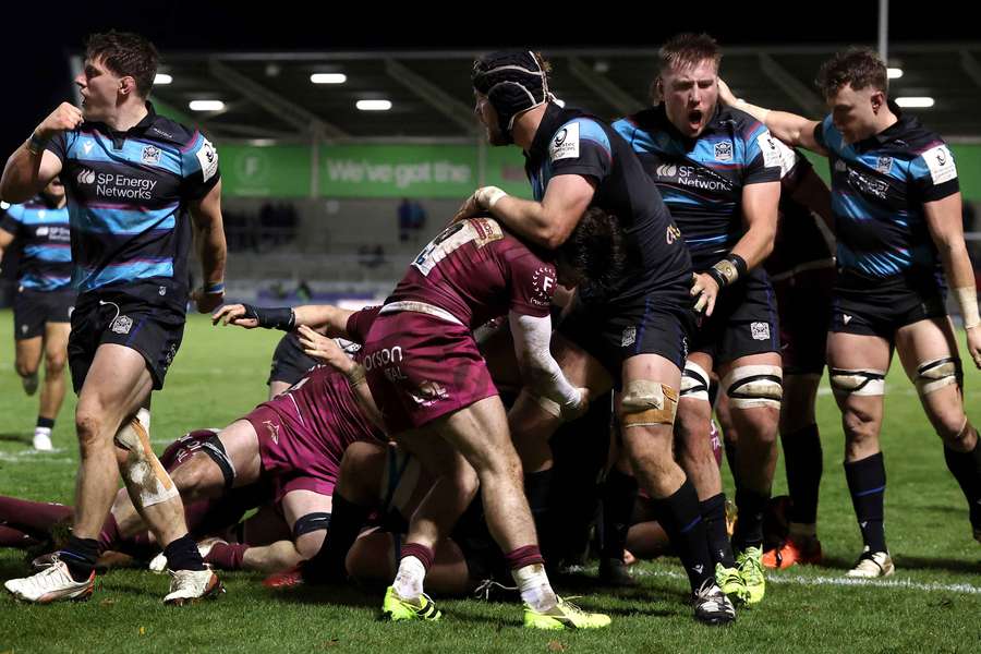 Glasgow Warriors celebrate after scoring a try against Sale Sharks
