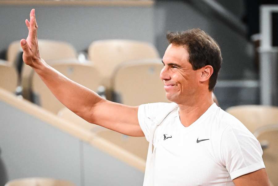 Nadala acknowledges the crowd at Roland Garros