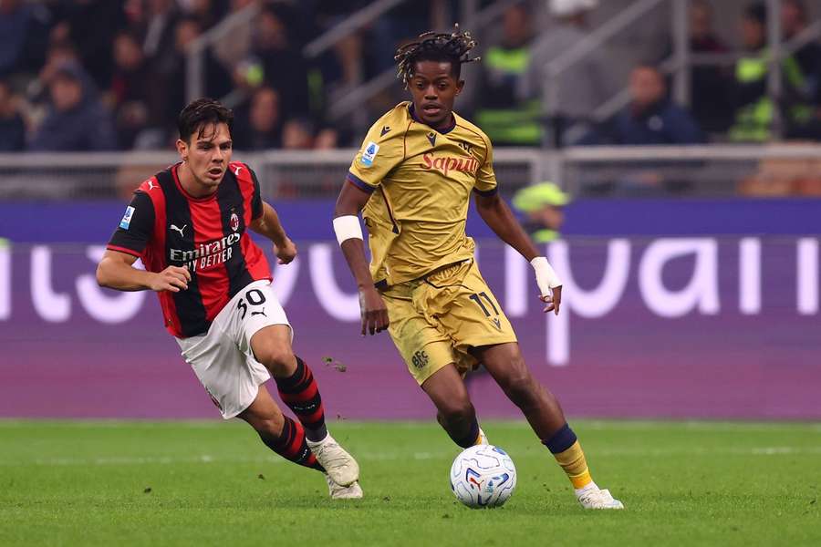 Bologna's Samuel Mbangula in action against AC Milan Bologna's Samuel Mbangula in action against AC Milan