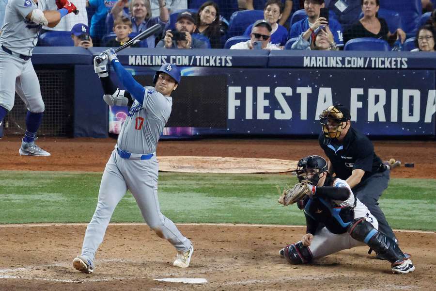 Shohei Ohtani hits his 50th home run of the season against the Miami Marlins