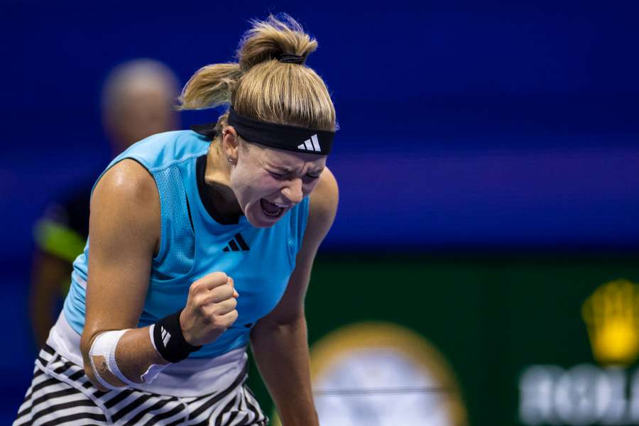 Muchova celebrates her win