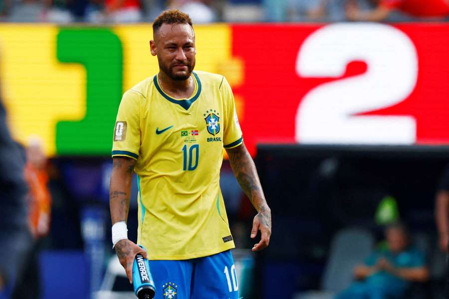 Neymar looks dejected after the match as Brazil are eliminated from the World Cup Neymar looks dejected after the match as Brazil are eliminated from the World Cup