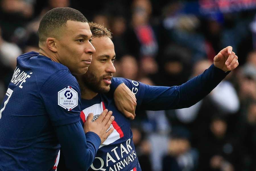 Neymar is congratulated by Mbappe after scoring against Lille at the weekend