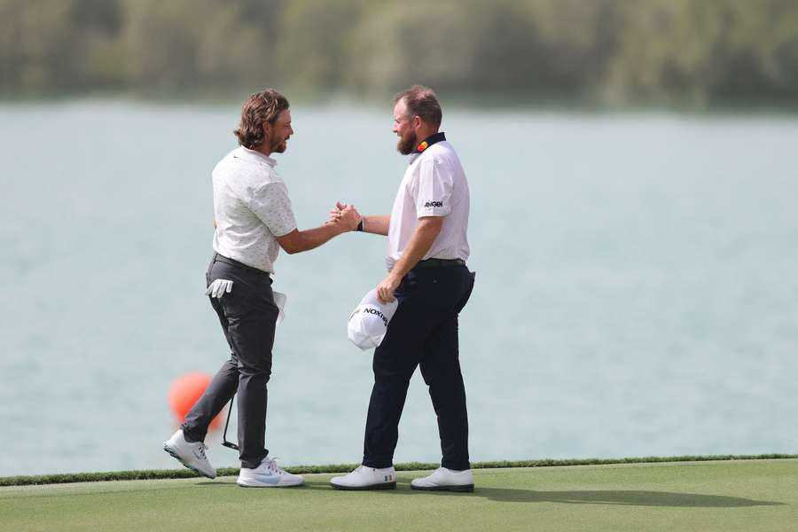 Fleetwood and Lowry shake hands in Abu Dhabi Fleetwood and Lowry shake hands in Abu Dhabi