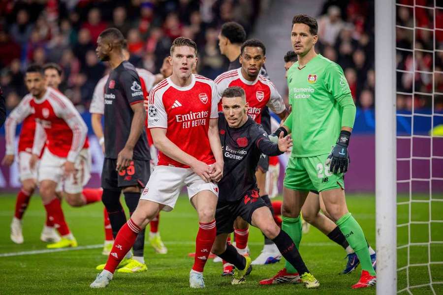 Arsenal's Viktor Gyokeres battles with Leverkusen's Alejandro Grimaldo