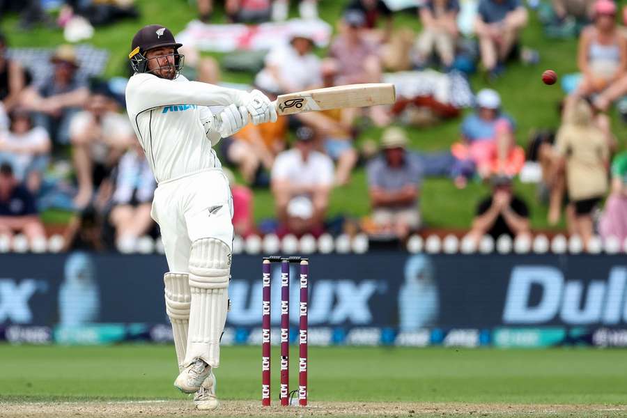 New Zealand's Tom Blundell plays a shot