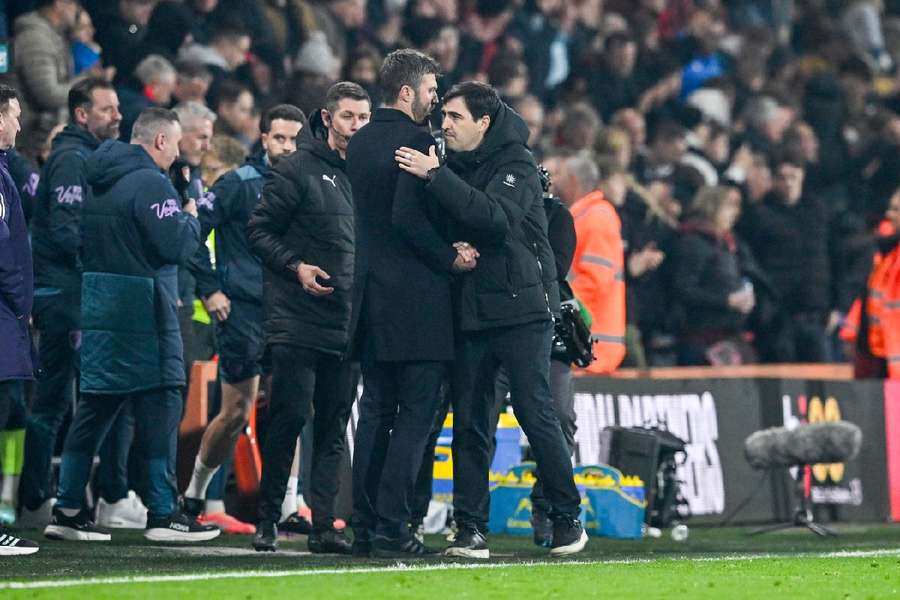 Michael Carrick and Andoni Iraola embrace at full-time 