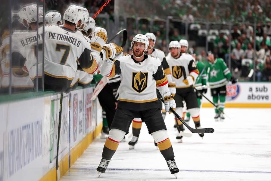 Jonathan Marchessault of the Vegas Golden Knights is congratulated by his teammates after scoring a goal
