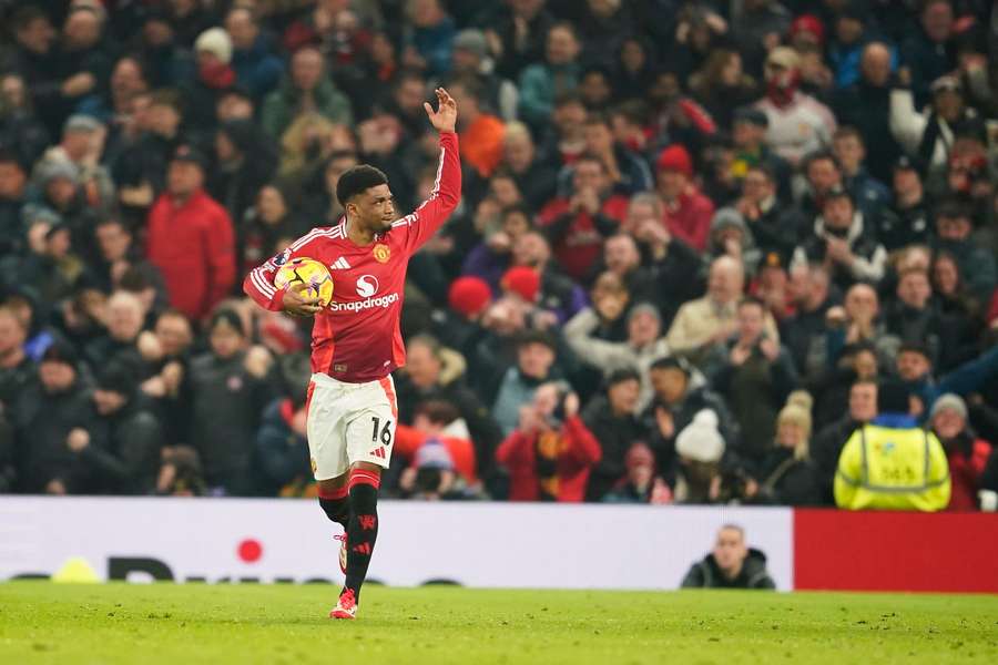 Amad celebrates scoring the equaliser