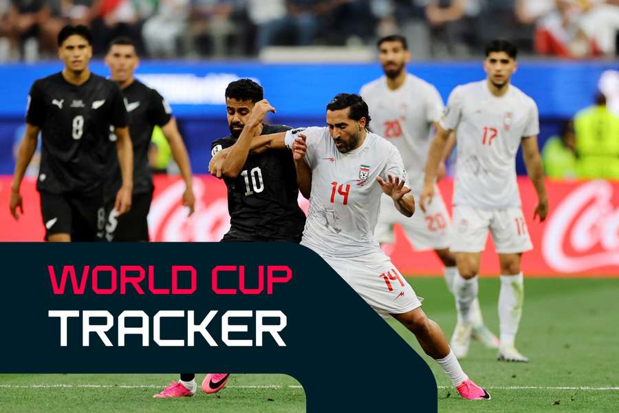 Sarpreet Singh and Saman Ghoddos wrestle for control of the ball at SoFi Stadium.