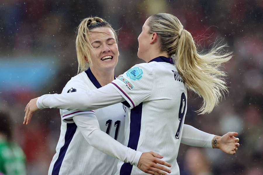 Alessia Russo of England celebrates scoring her team's first goal with teammate Lauren Hemp