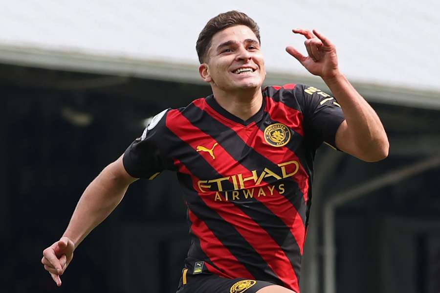 Manchester City's Argentinian striker Julian Alvarez celebrates after scoring their second goal