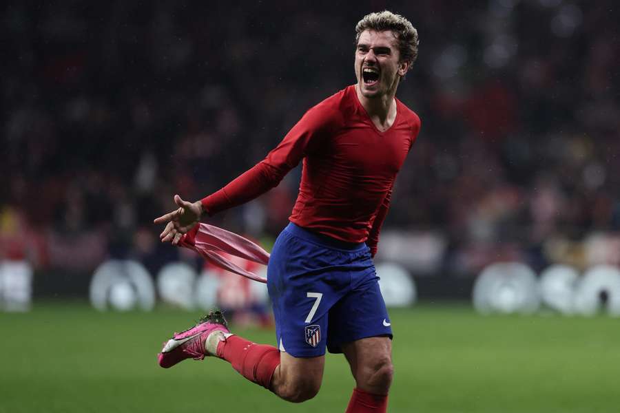 Atletico Madrid's French forward #07 Antoine Griezmann celebrates scoring his team's third goal