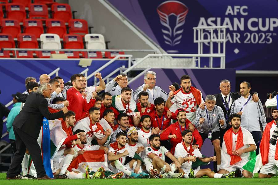 Asian Cup debutants Tajikistan celebrate reaching the quarter-finals