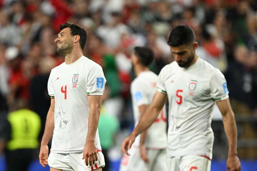 Iran players look devastated after late goal was ruled out