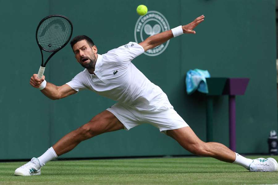 Novak Djokovic in action during his third-round match Novak Djokovic in action during his third-round match