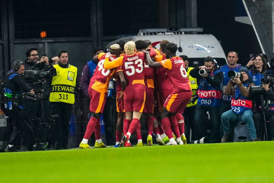 Galatasaray celebrate their goal during their win over Liverpool in the Champions League on Tuesday.