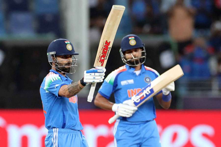 Kohli celebrates reaching his half-century