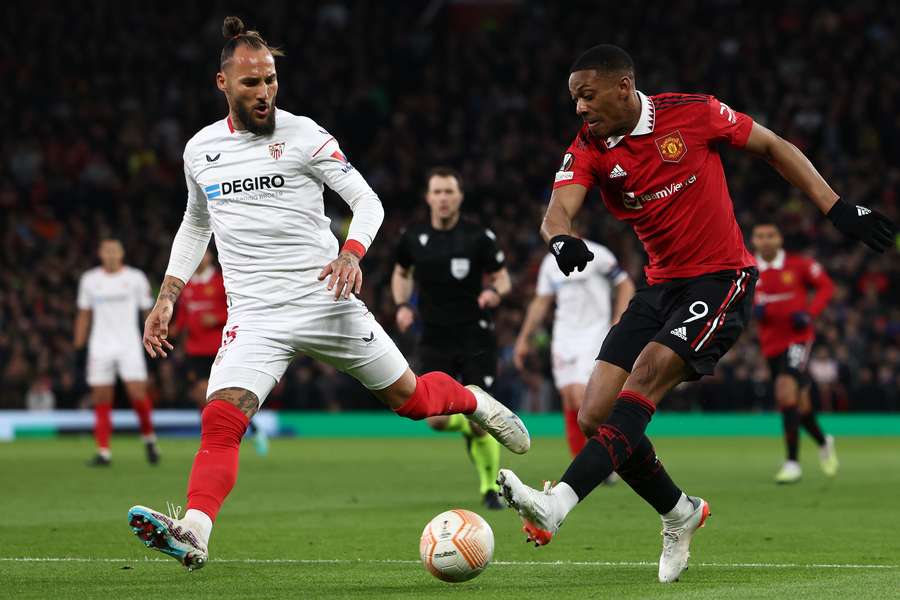 Manchester United's French striker Anthony Martial crosses the ball