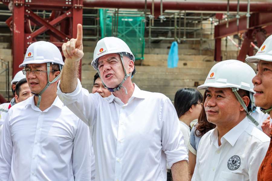 President of FIFA Gianni Infantino gestures as he visits the construction site of PVF Stadium President of FIFA Gianni Infantino gestures as he visits the construction site of PVF Stadium