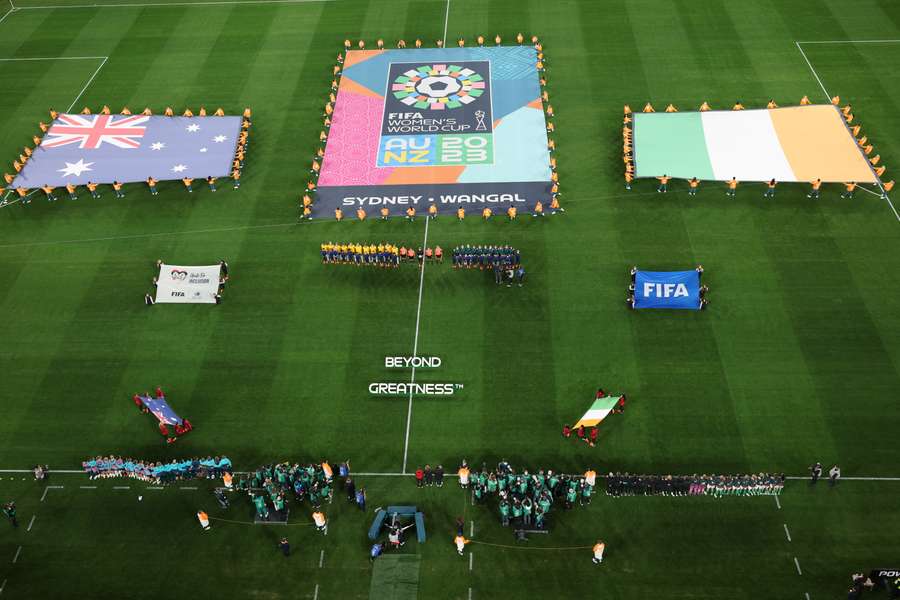 The players line up ahead of kick-off