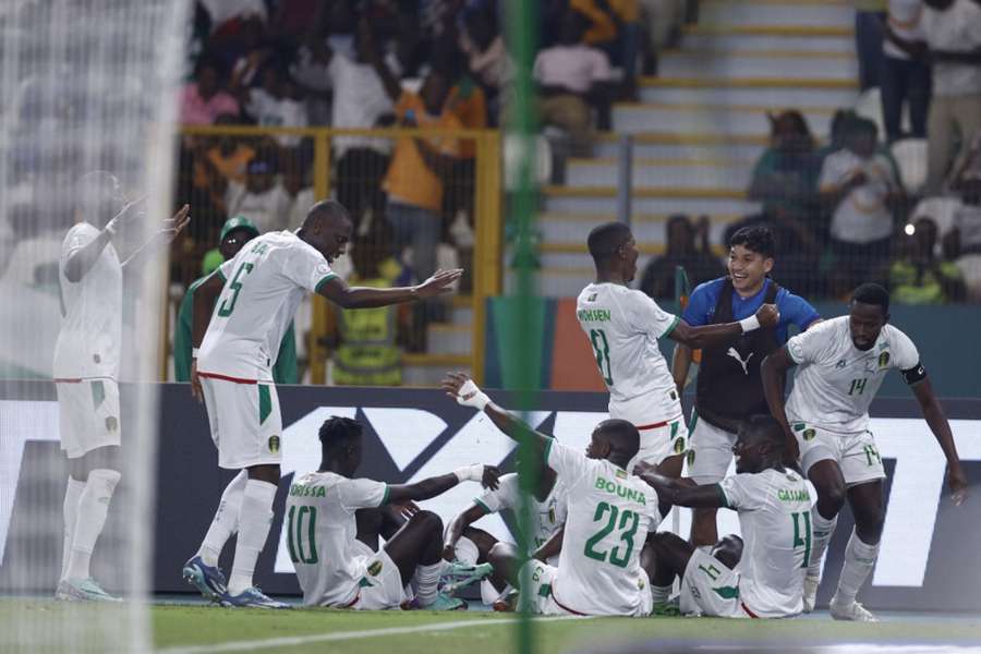 Mauritania players celebrate their winner