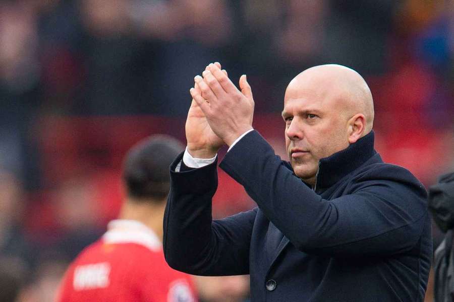 Liverpool manager Arne Slot applauds