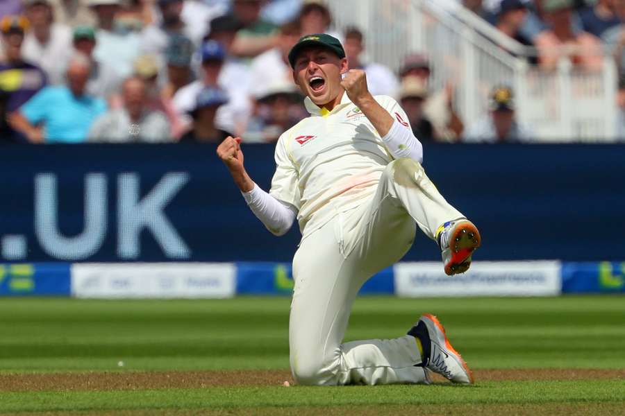 Australia's Marnus Labuschagne celebrates after catching the ball to take the wicket England's Harry Brook