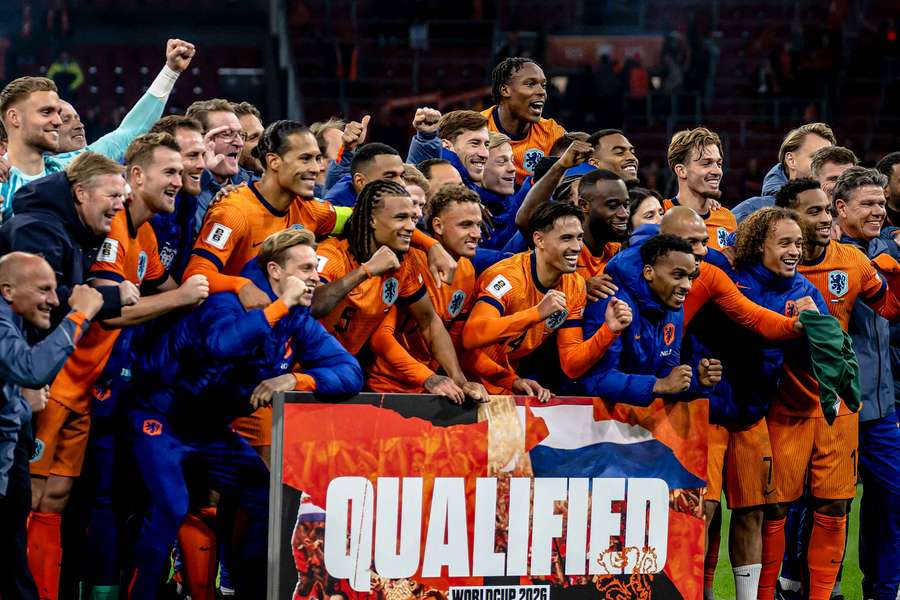 Netherlands players celebrate qualifying for the 2026 FIFA World Cup