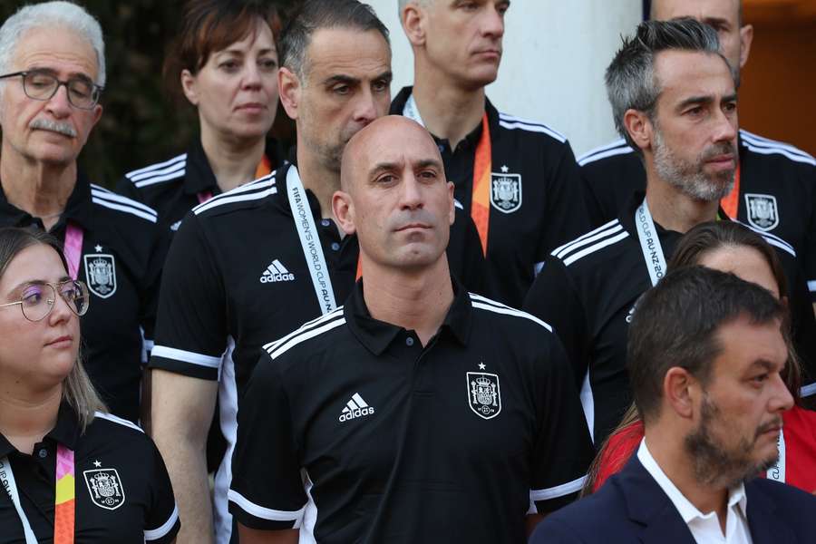 Rubiales (C) watches the players arrive to greet their Prime Minister in Madrid