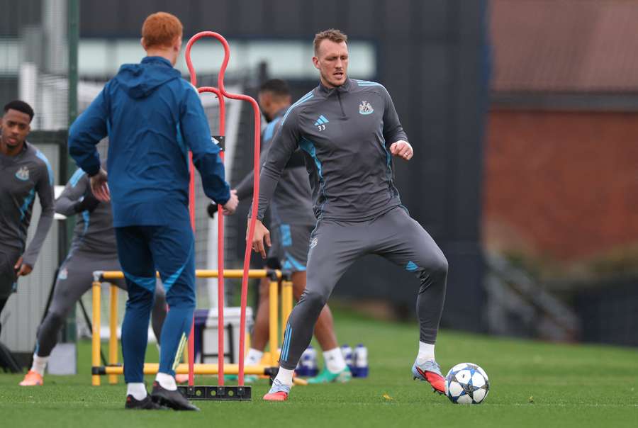 Newcastle United player Dan Burn in action during training Newcastle United player Dan Burn in action during training