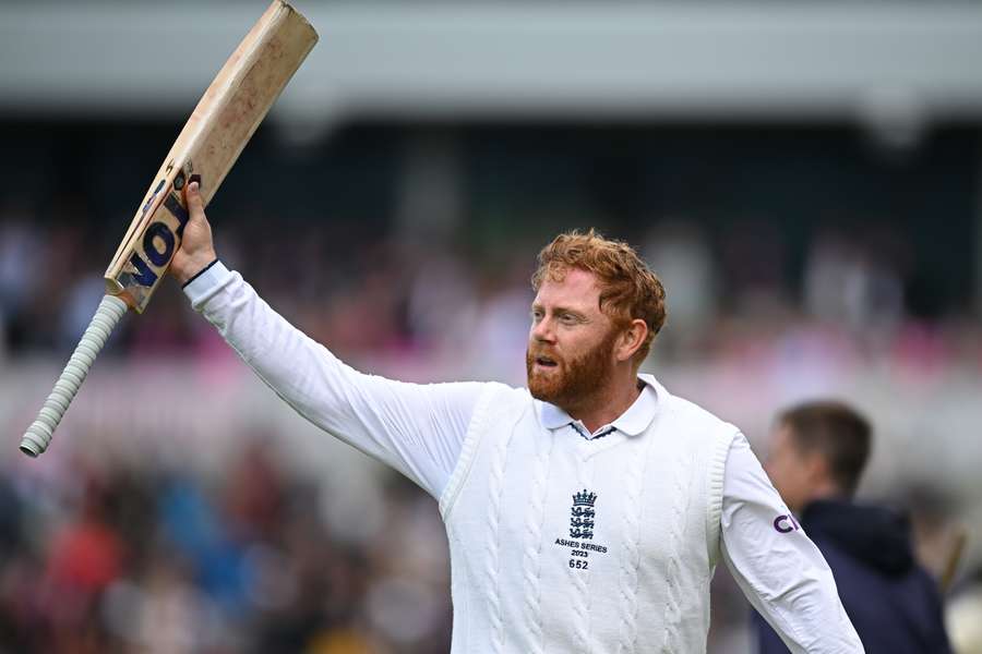 Jonny Bairstow raises his bat to the crowd as he leaves the field unbeaten on 99