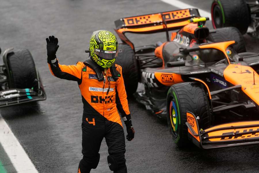 Norris waves to the crowd after qualifying