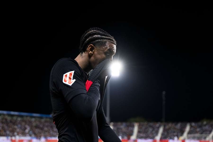 Balde reacts after suffering an injury