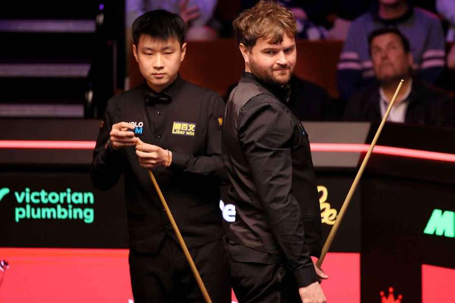 Zhao Xintong (L) and Liam Highfield delivered a thrilling opening session