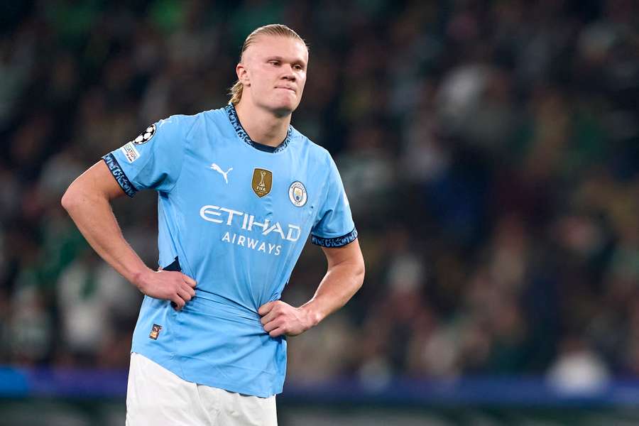 Erling Haaland of Manchester City reacts after missing a penalty kick