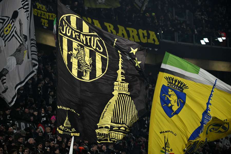 Juventus fans with flags inside the stadium