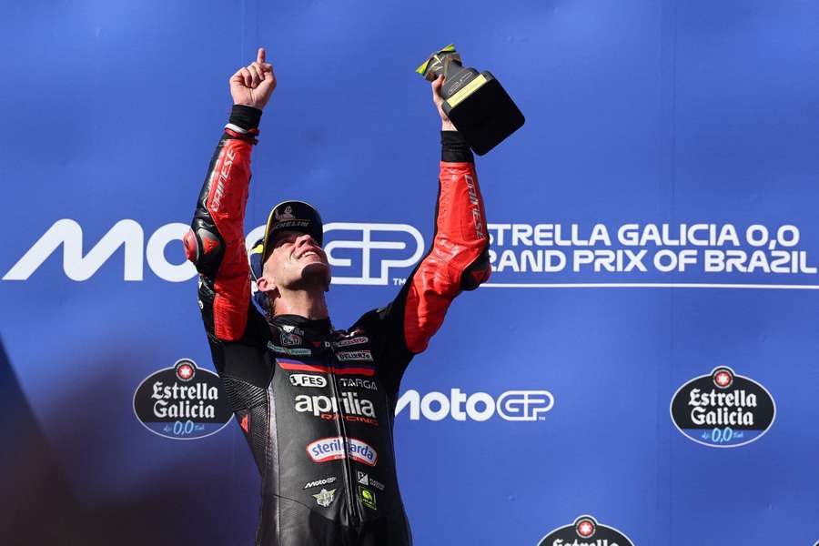 Marco Bezzecchi lifts the trophy in Brazil