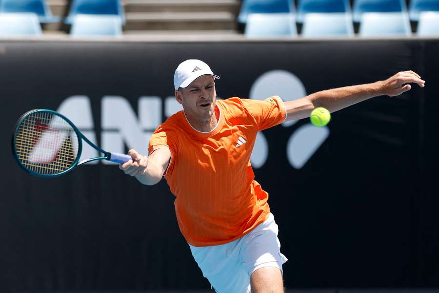 Hubert Hurkacz returns a serve during his second round Australian Open defeat. 