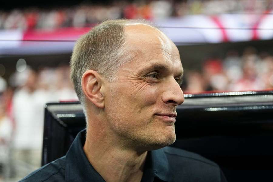 Tuchel smiling during England's win Tuchel smiling during England's win