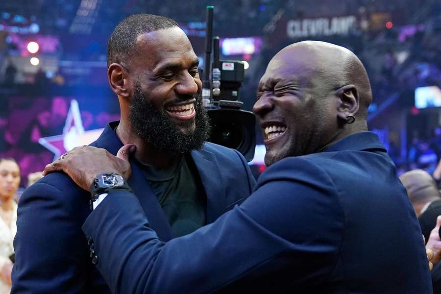 LeBron James shares a laugh with Michael Jordan during an NBA All-Star game in 2022