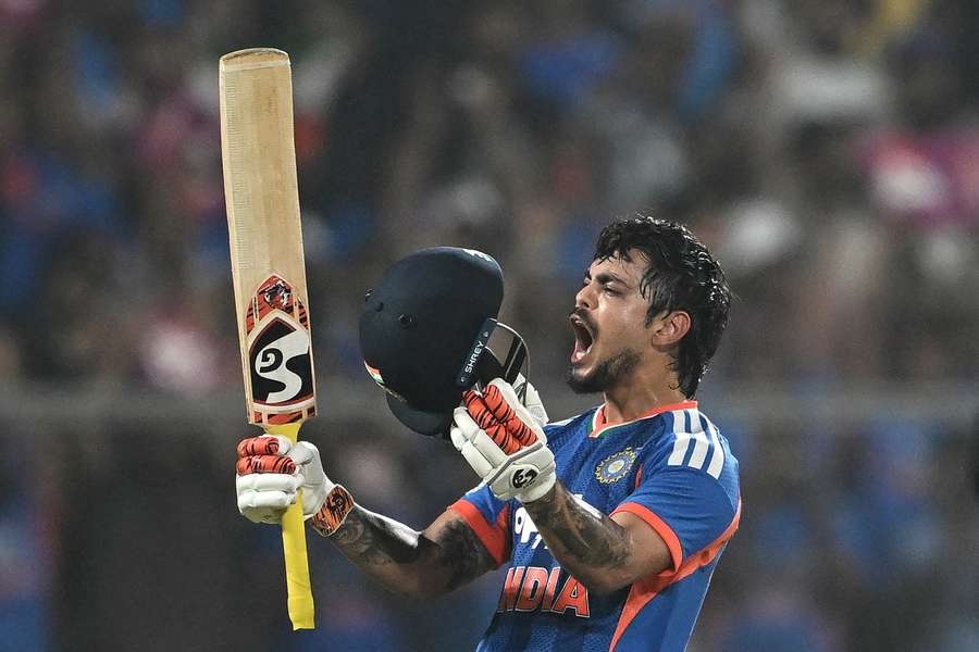 India's Ishan Kishan celebrates after scoring his century