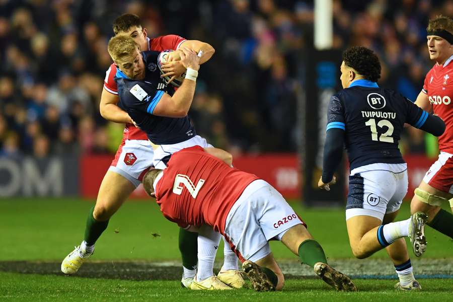 Scotland's wing Kyle Steyn is tackled during the Six Nations international rugby union match 